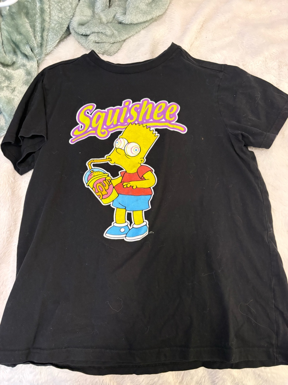 Black Graphic Tee with Colorful Cartoon Bart and 'Squishsee' Logo